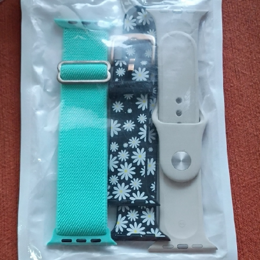 Apple Watch Bands in Aqua, Black Daisy, and Light Gray